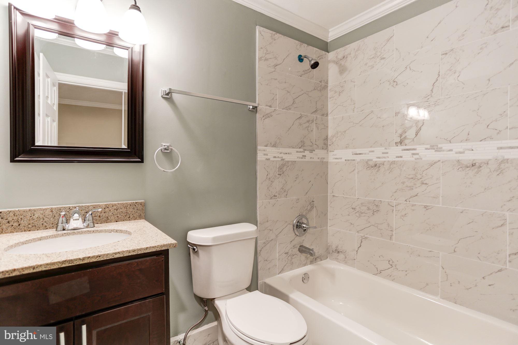 8453 Snowden Oaks Place Laurel, MD 20708 - Photo 23 of 37 Hallway Full Bath