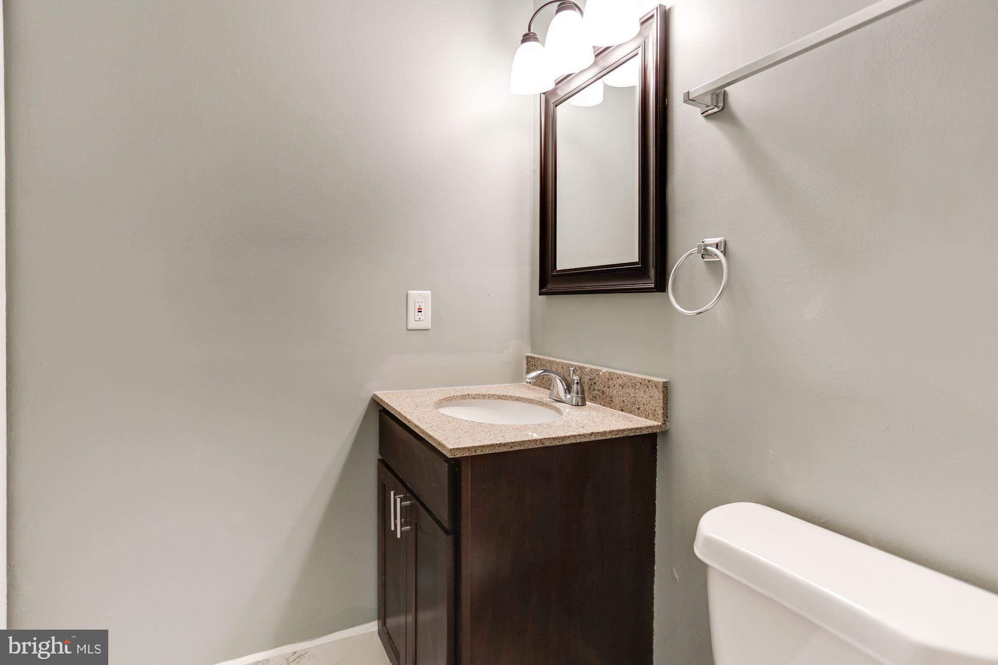 8453 Snowden Oaks Place Laurel, MD 20708 - Photo 24 of 37 Hallway Full Bath