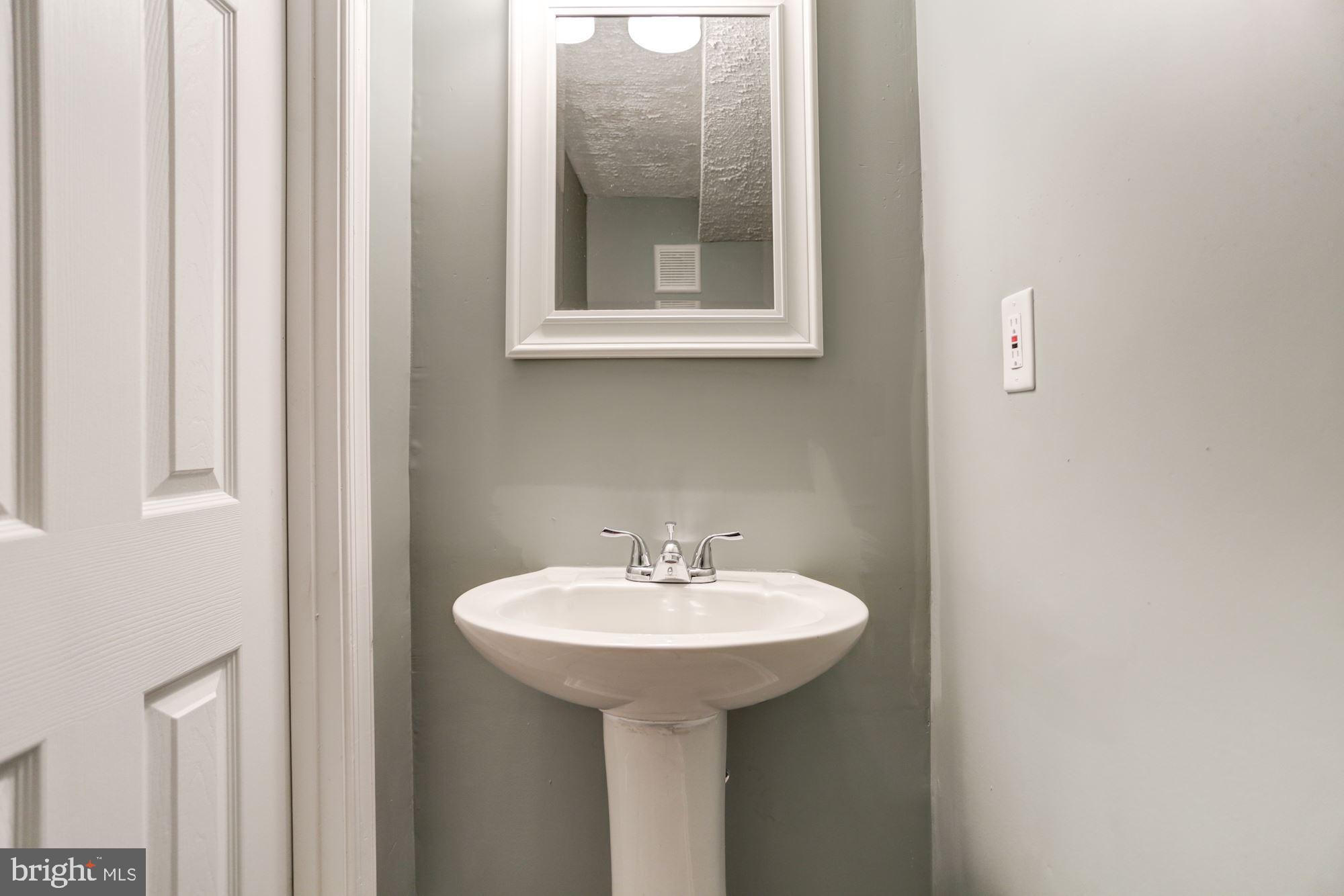 8453 Snowden Oaks Place Laurel, MD 20708 - Photo 27 of 37 Basement Powder Room