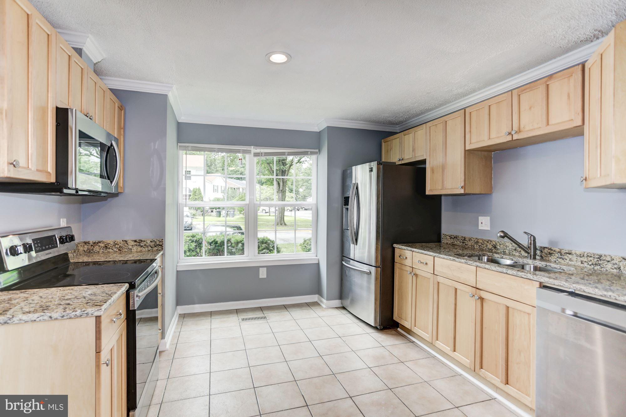 8453 Snowden Oaks Place Laurel, MD 20708 - Photo 5 of 37 Kitchen