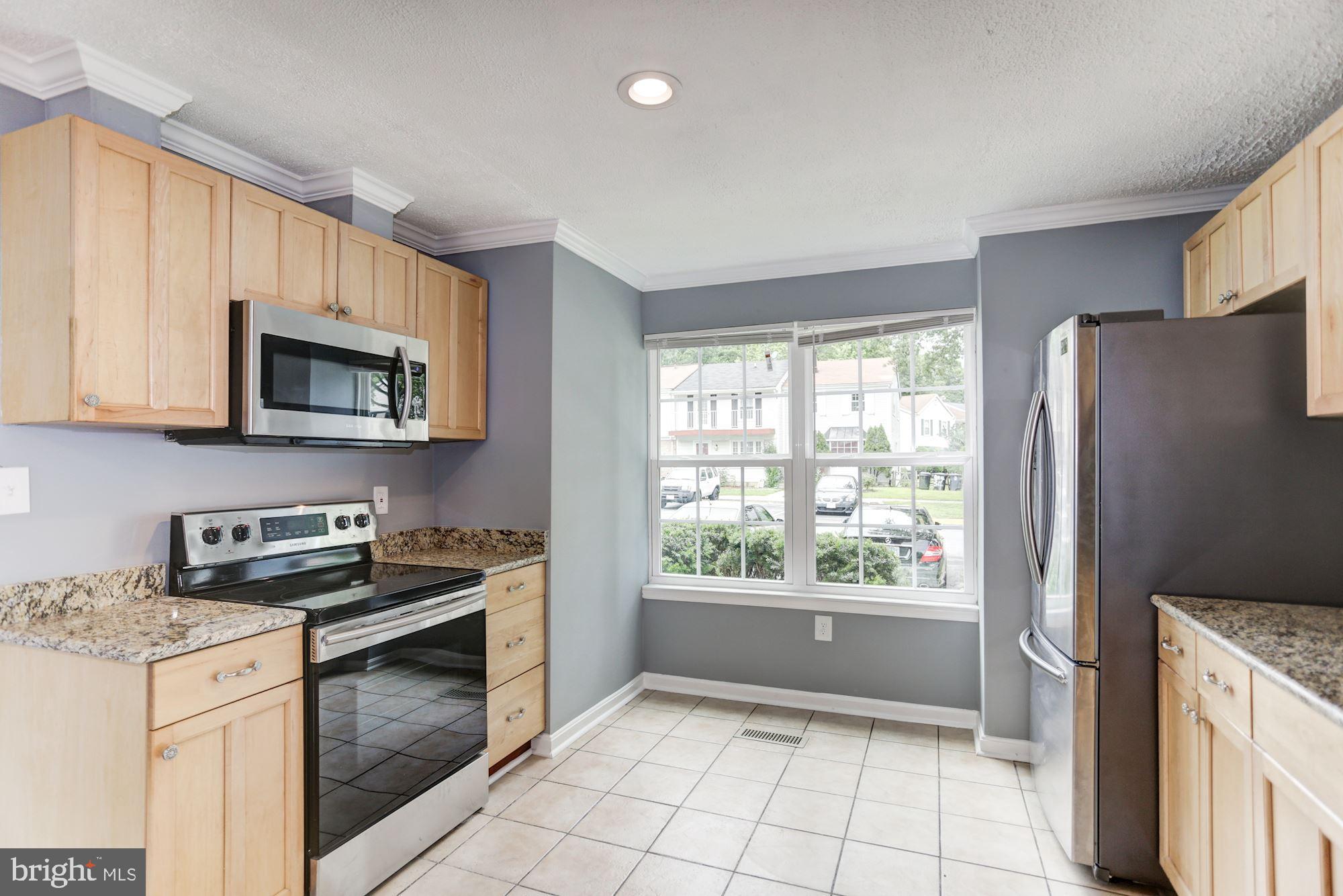 8453 Snowden Oaks Place Laurel, MD 20708 - Photo 7 of 37 Kitchen