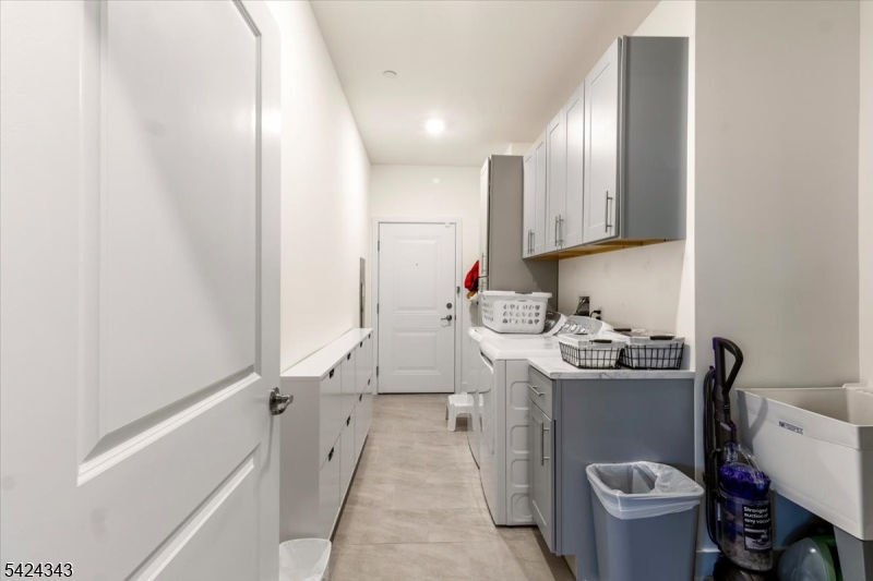 11 Veterans Way, Unit 111 Morris Plains, NJ 07950 - Photo 21 of 21 a kitchen with a sink cabinets and wooden floor