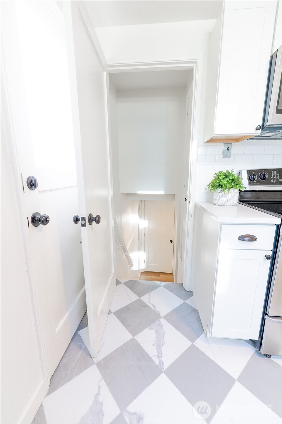 6012 40th Avenue Northeast Seattle, WA 98115 - Photo 17 of 28 a bathroom with a sink and a shower