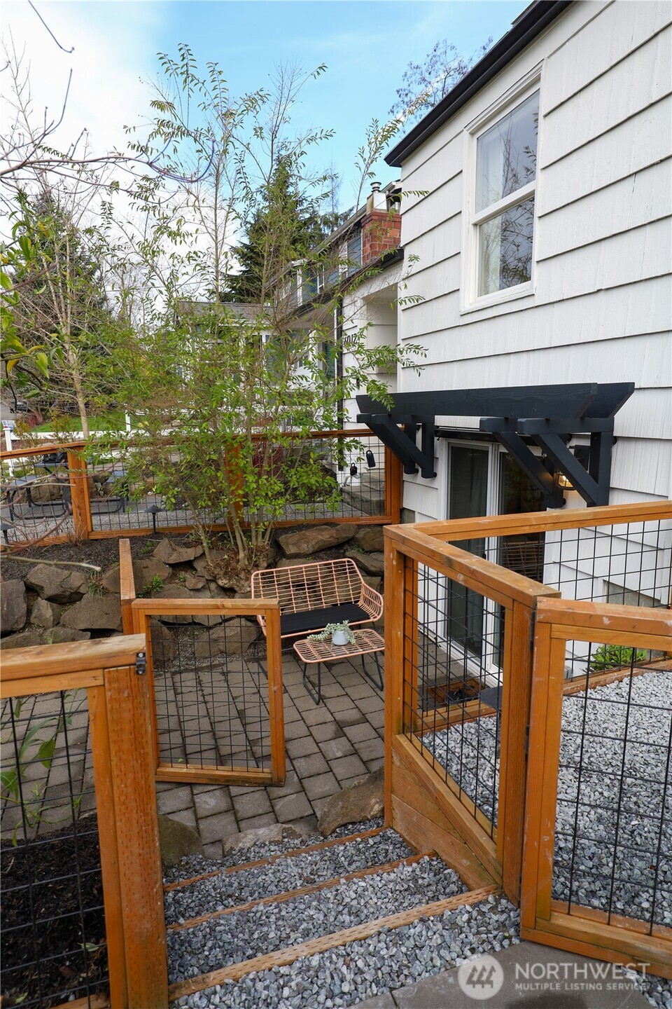 6012 40th Avenue Northeast Seattle, WA 98115 - Photo 25 of 28 a view of a house with backyard and sitting area