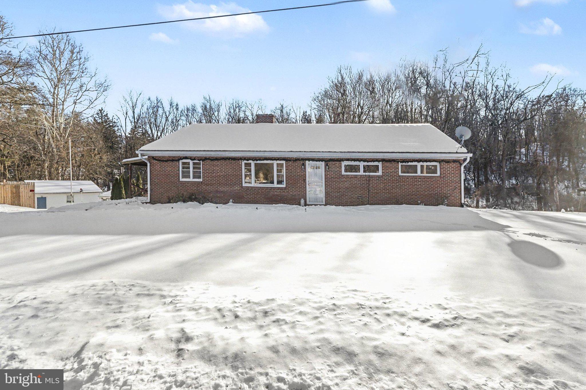 908 Red Hill Road Dauphin, PA 17018 - Photo 2 of 33 a view of a house with a snow in the yard