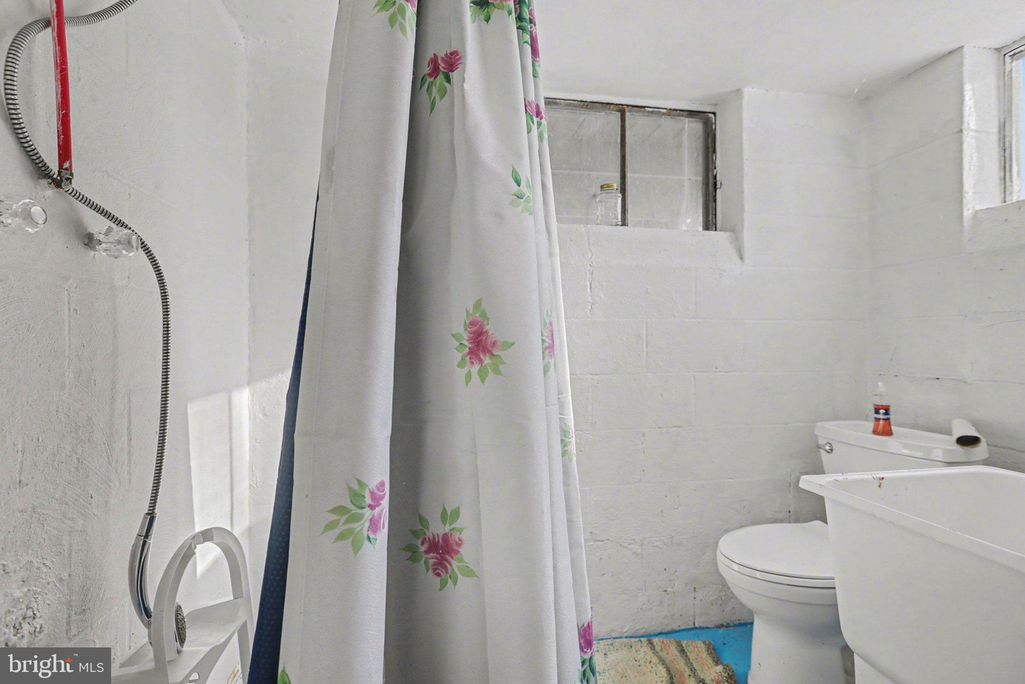 908 Red Hill Road Dauphin, PA 17018 - Photo 26 of 33 a white toilet sitting next to a bathroom sink