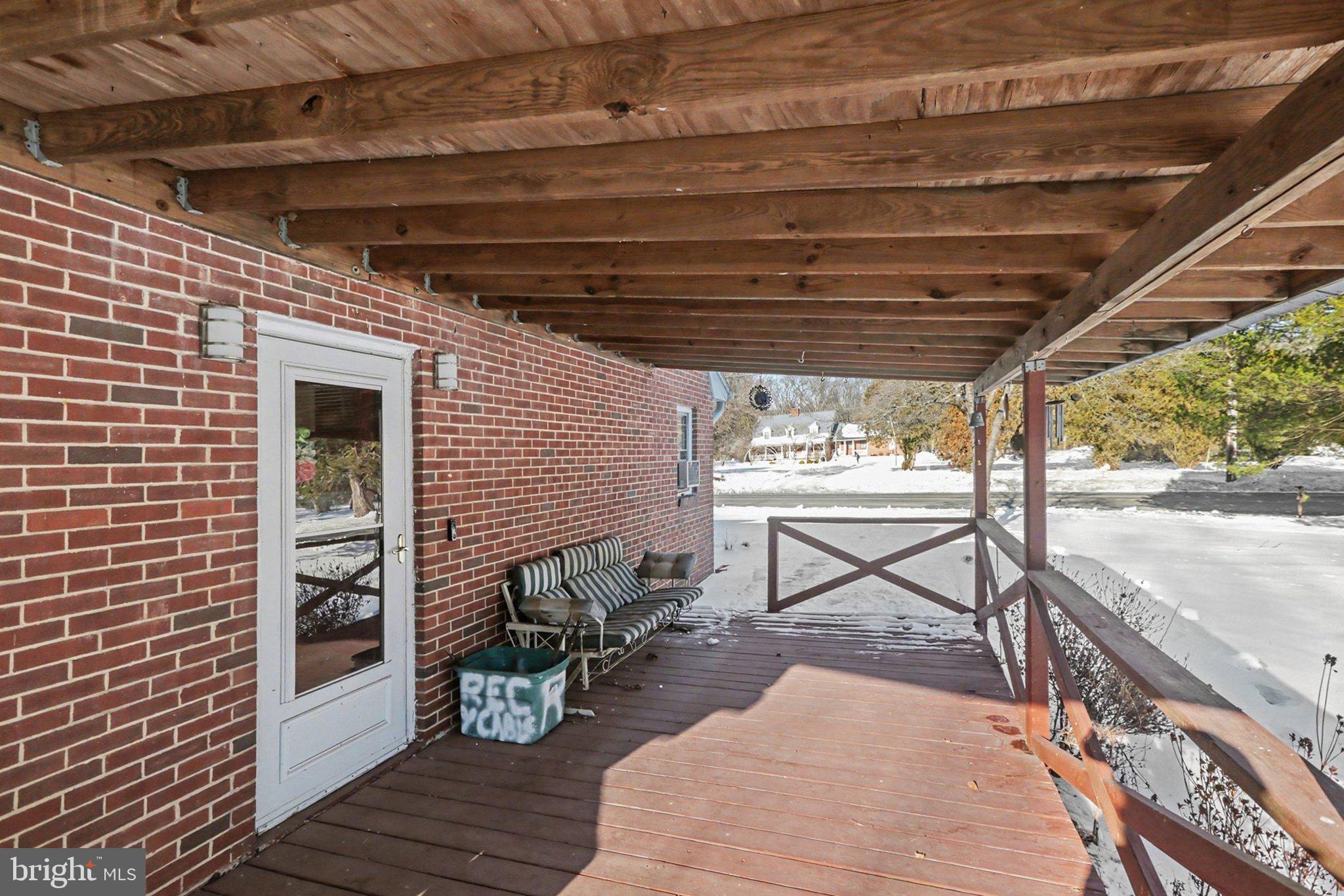908 Red Hill Road Dauphin, PA 17018 - Photo 31 of 33 a building outdoor space with patio furniture and wooden floor