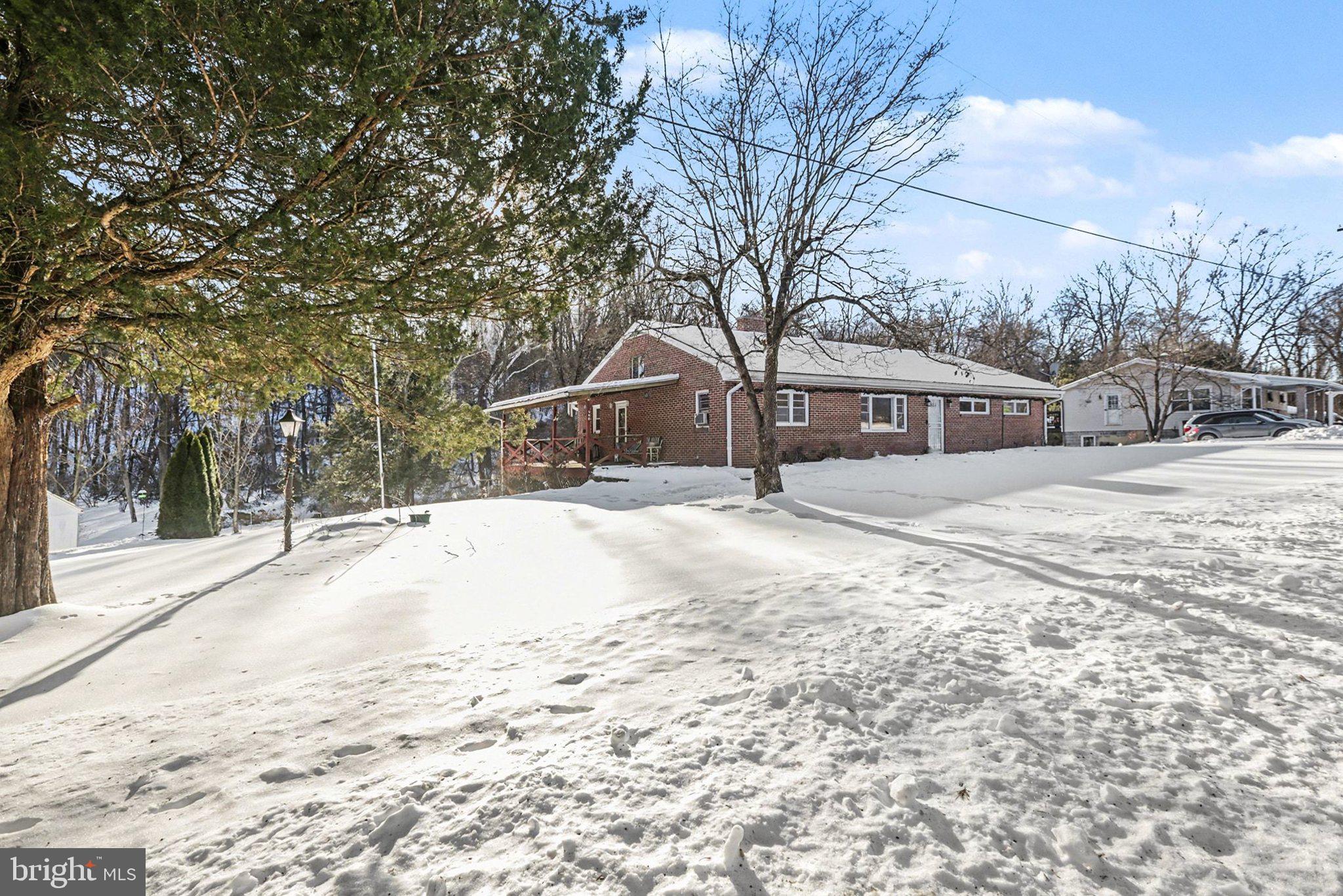 908 Red Hill Road Dauphin, PA 17018 - Photo 4 of 33 a house with trees in the background