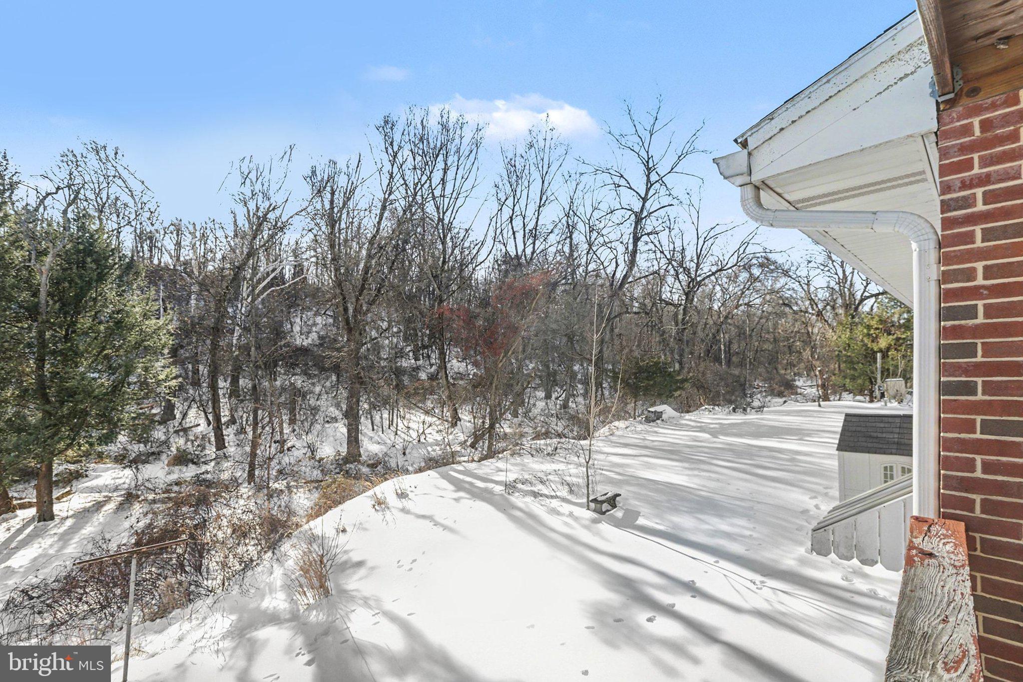 908 Red Hill Road Dauphin, PA 17018 - Photo 5 of 33 a view of white house with a road and trees