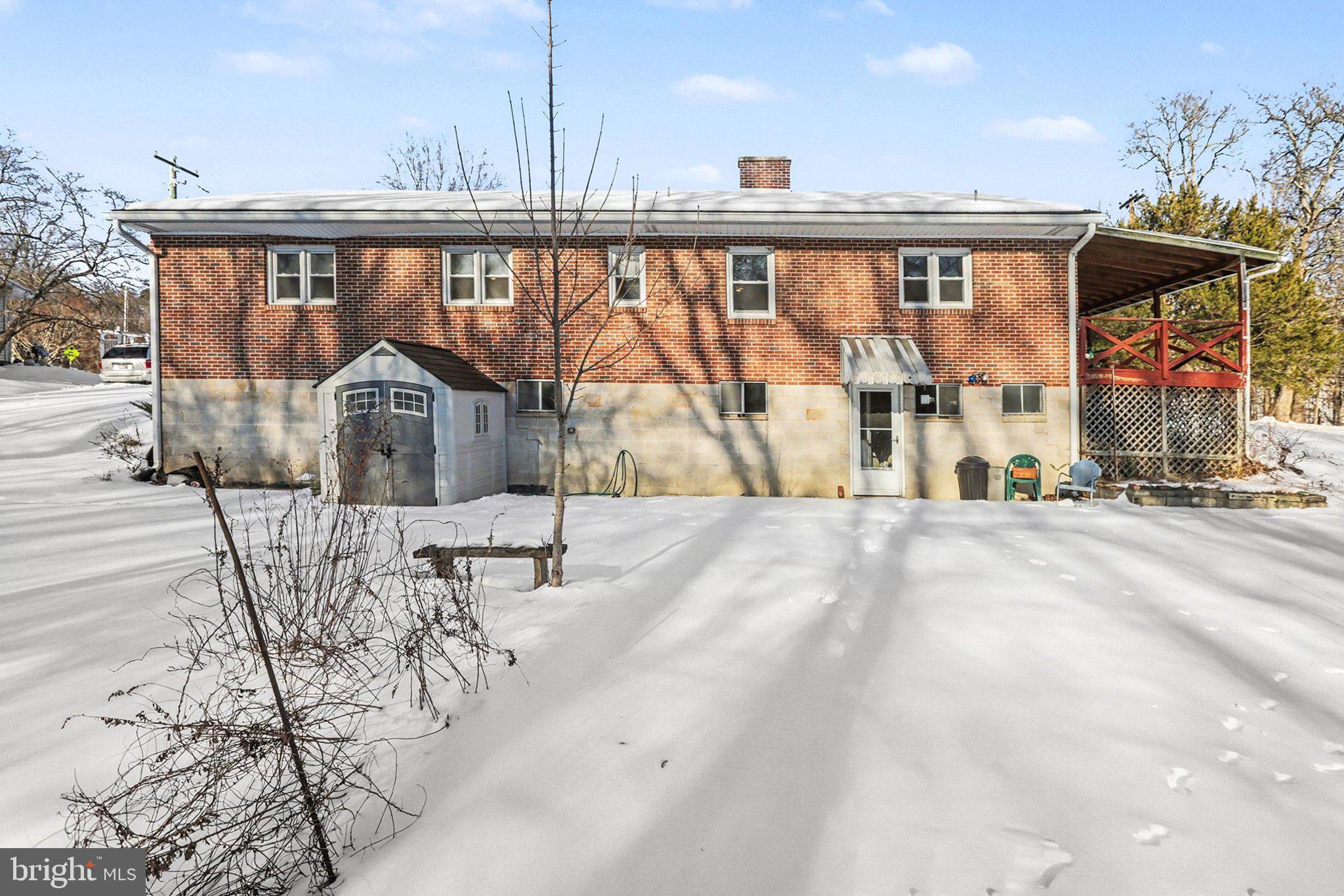 908 Red Hill Road Dauphin, PA 17018 - Photo 7 of 33 a view of a building with wooden floor