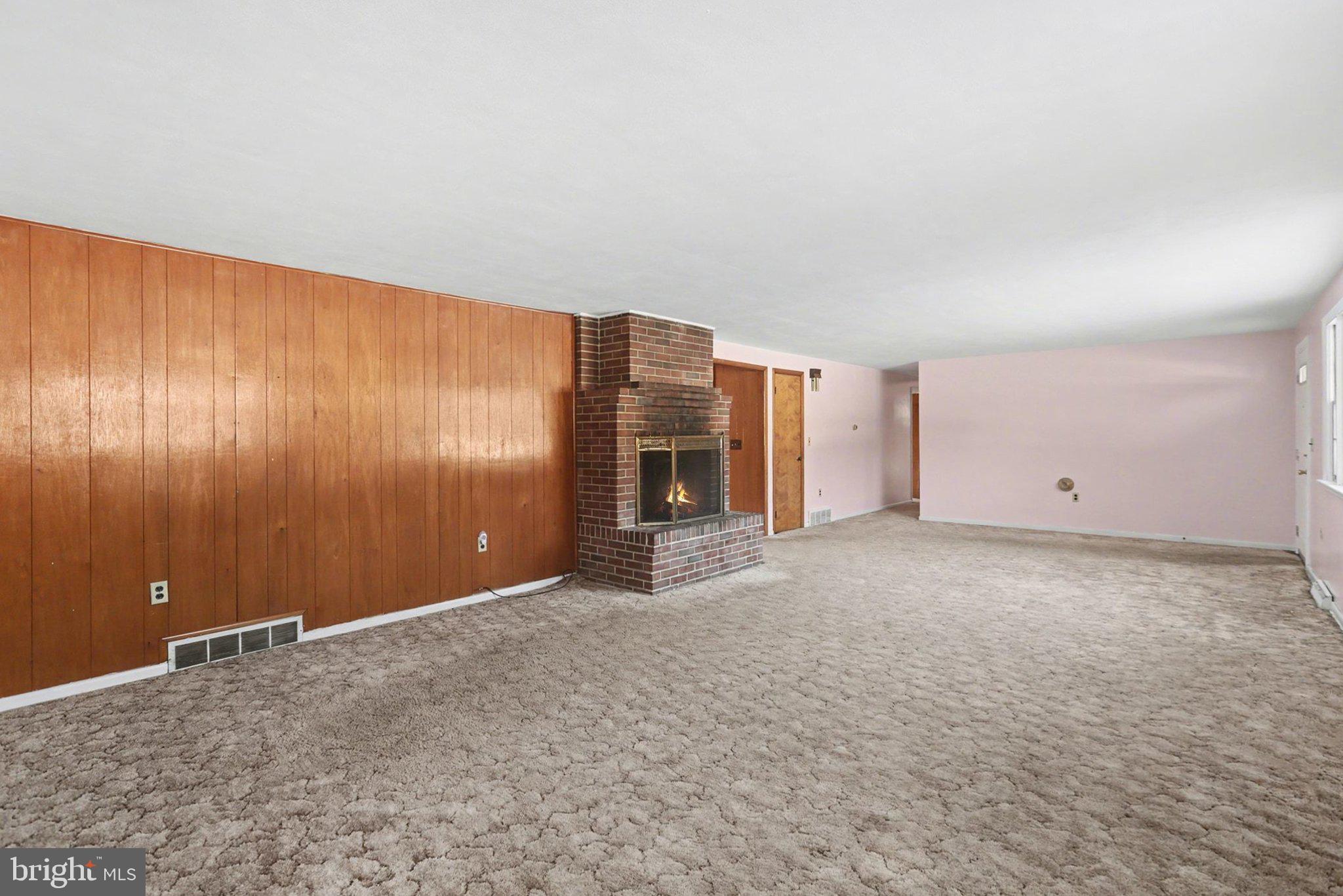 908 Red Hill Road Dauphin, PA 17018 - Photo 9 of 33 a view of an empty room with wooden floor