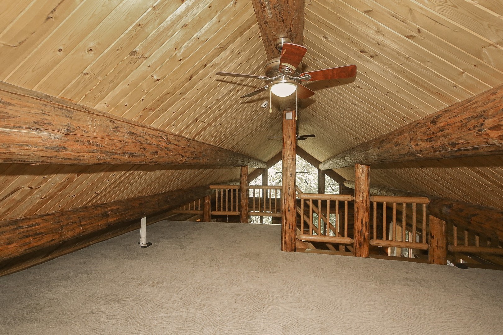 8108 Crystal Springs Road Bull Valley, IL 60098 - Photo 18 of 33 a view of an empty room with a chandelier