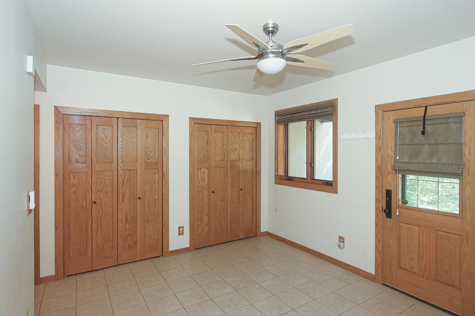 8108 Crystal Springs Road Bull Valley, IL 60098 - Photo 20 of 33 a view of an empty room with a window