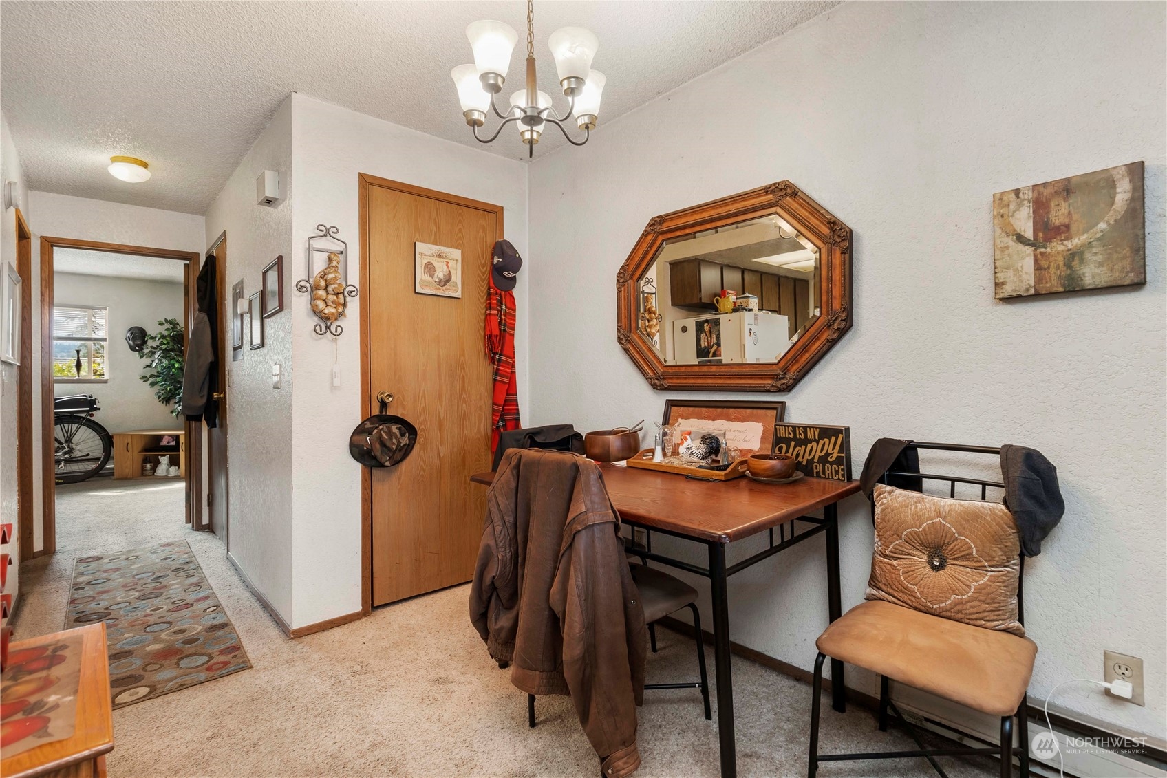 2000 Alabama Street Bellingham, WA 98229 - Photo 15 of 17 a view of a livingroom with furniture and a chandelier