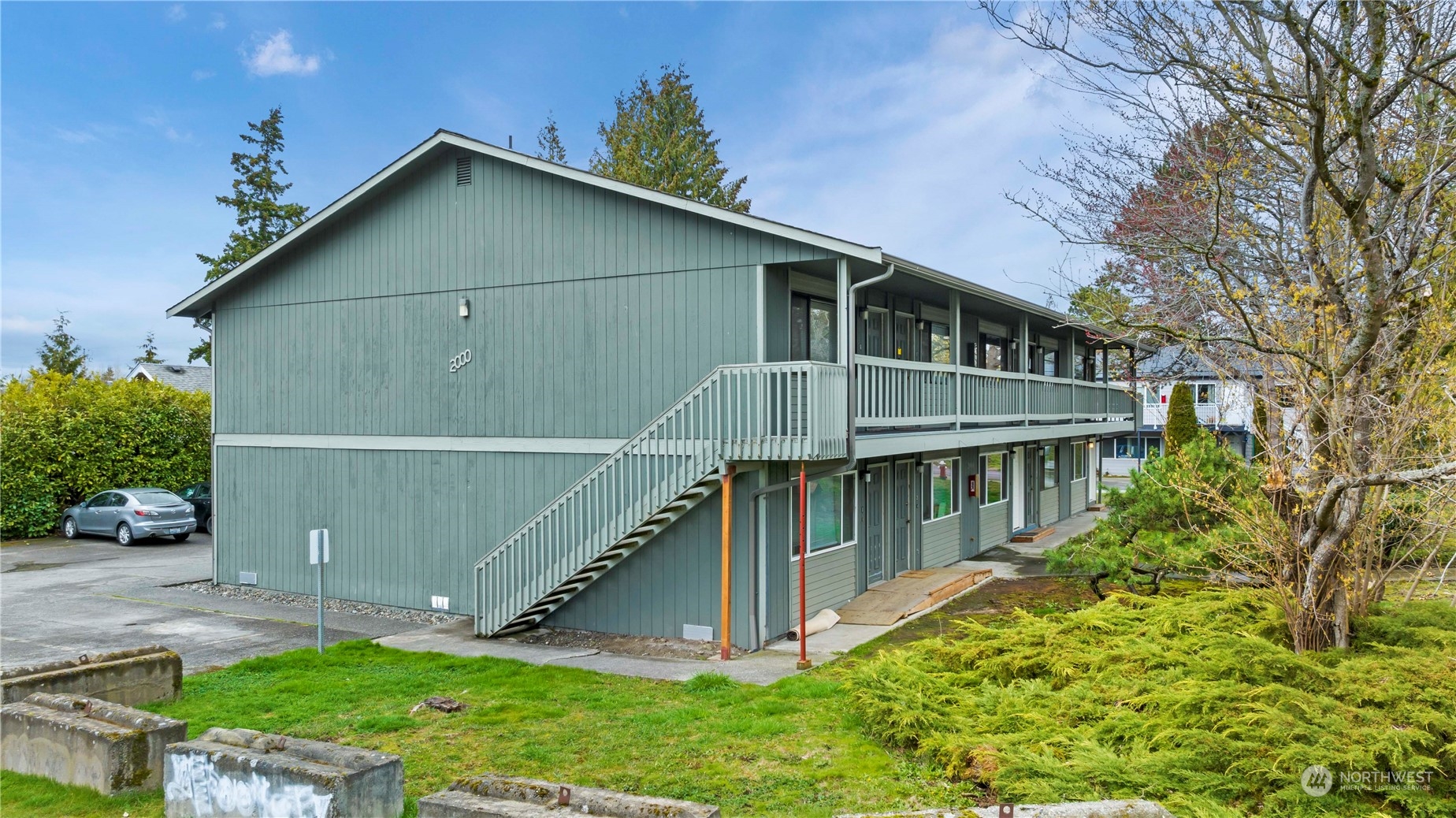 2000 Alabama Street Bellingham, WA 98229 - Photo 4 of 17 a house with trees in the background