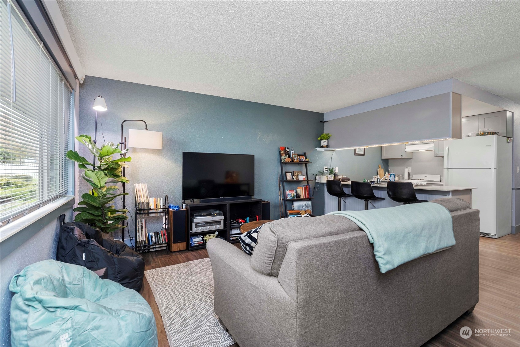2000 Alabama Street Bellingham, WA 98229 - Photo 7 of 17 a living room with furniture and a flat screen tv