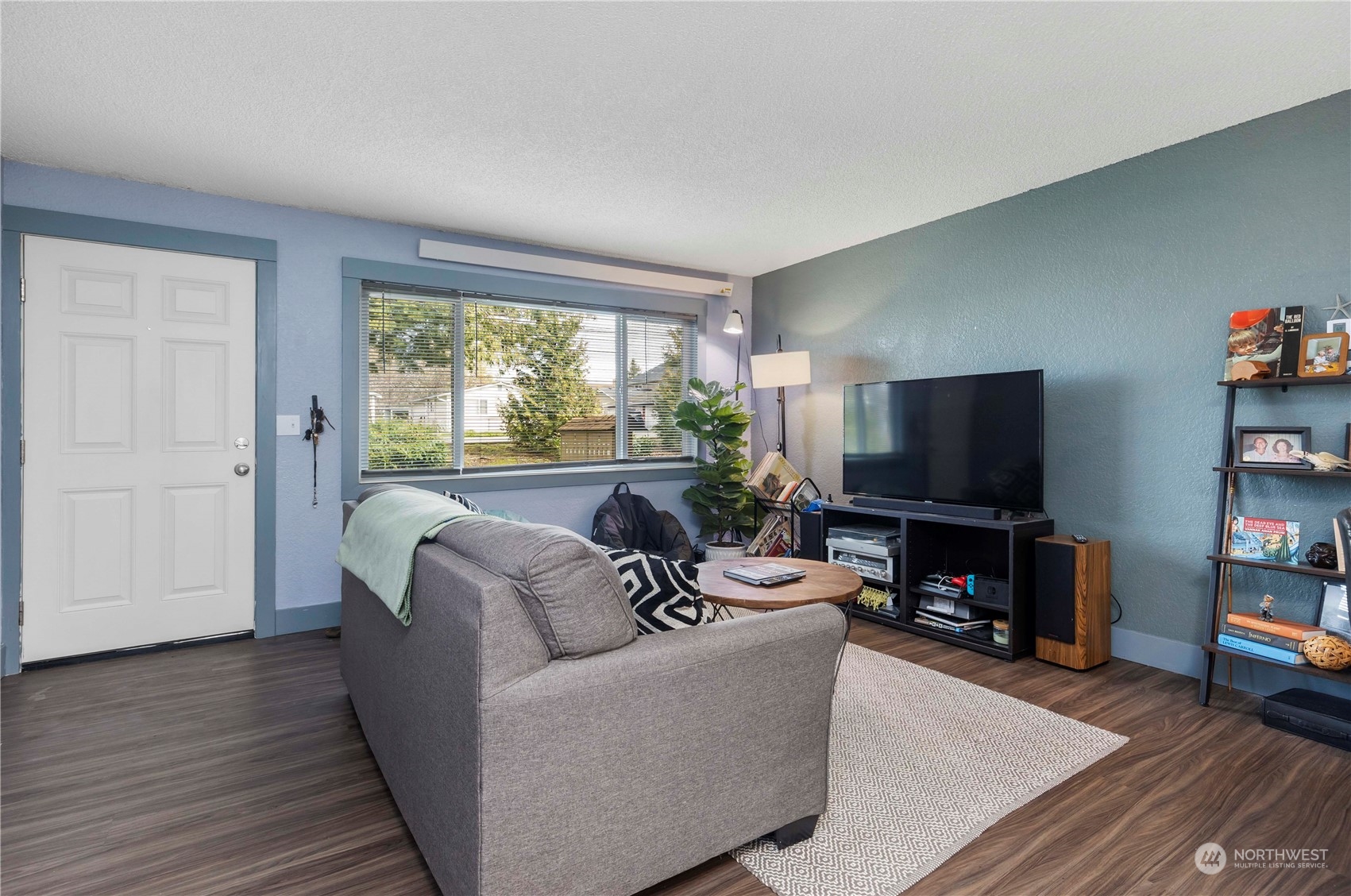 2000 Alabama Street Bellingham, WA 98229 - Photo 8 of 17 a living room with furniture and a flat screen tv