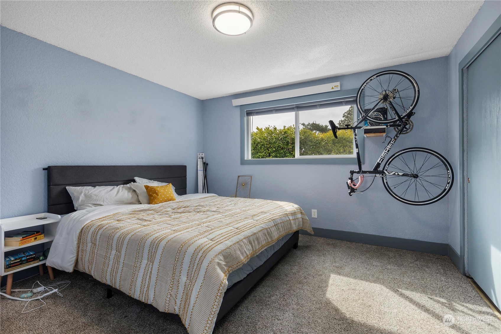 2000 Alabama Street Bellingham, WA 98229 - Photo 10 of 17 a bedroom with a bed a window and dresser