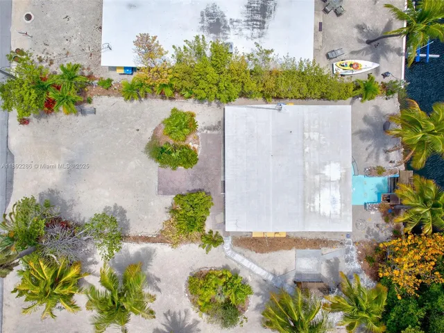 a view of swimming pool with a patio