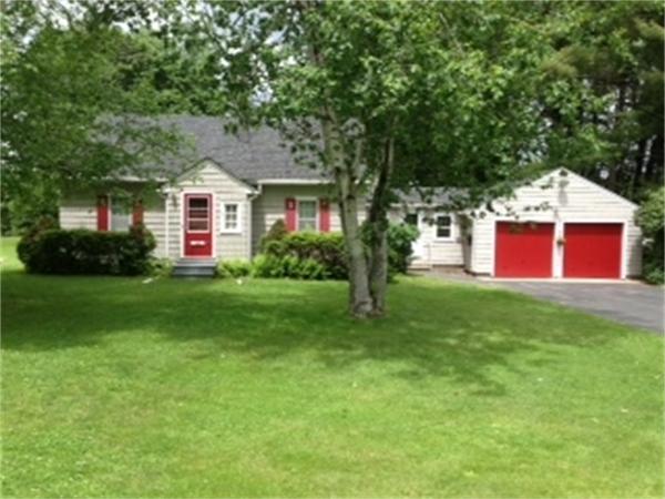 399 Burts Pit Road Northampton, MA 01062 - Photo 1 of 6 a front view of house with yard and green space