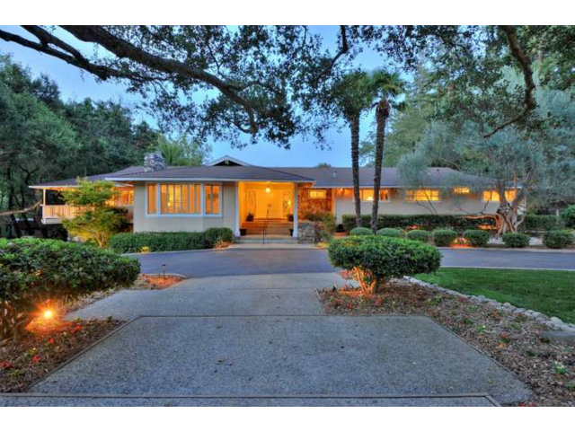 a view of a garden with an outdoor space