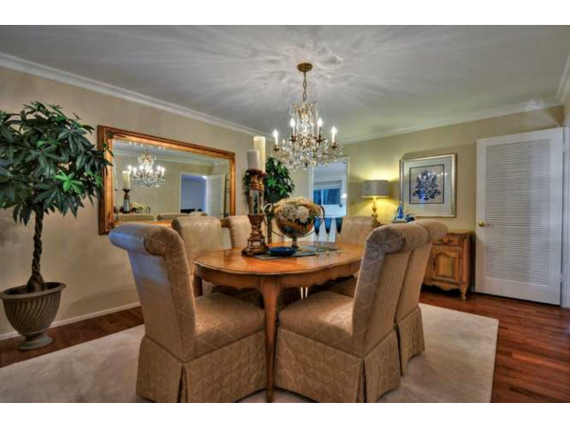 15722 Lancaster Road Monte Sereno, CA 95030 - Photo 4 of 23 a view of a dining room with furniture and chandelier