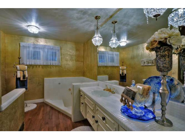 15722 Lancaster Road Monte Sereno, CA 95030 - Photo 8 of 23 a kitchen with a sink and cabinets