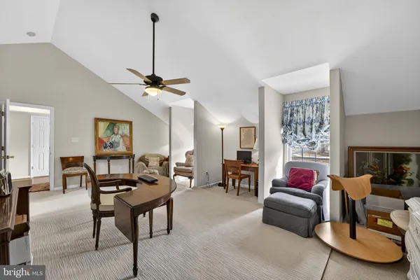 a view of a hallway with front door