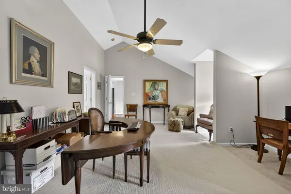 a bed room with a bed and a window