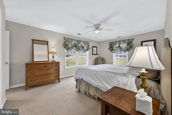 a view of a room with a hanging light