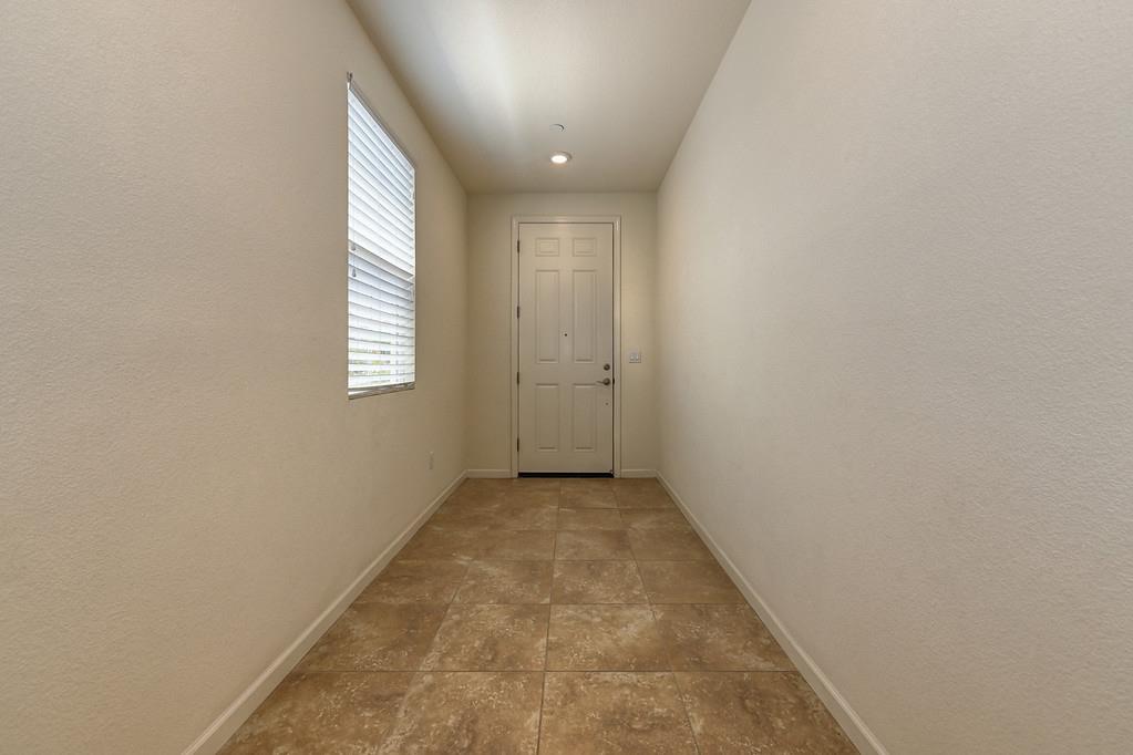 3231 Foxton Way Rancho Cordova, CA 95670 - Photo 4 of 29 an empty room with windows