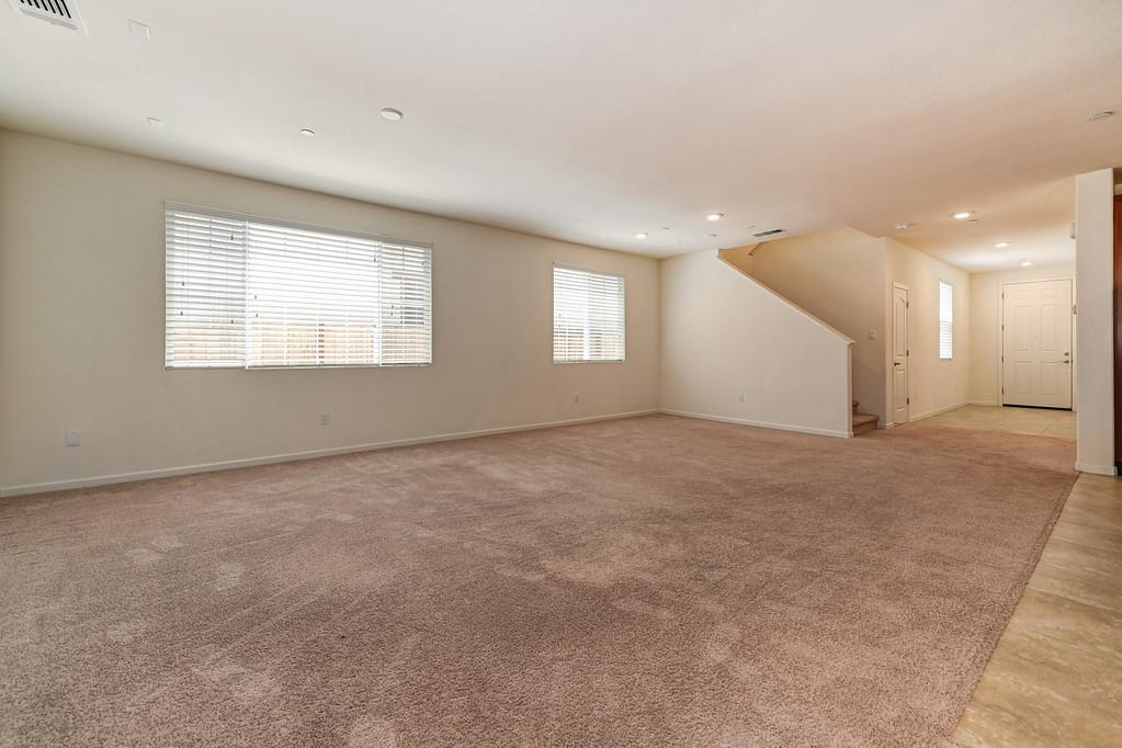 3231 Foxton Way Rancho Cordova, CA 95670 - Photo 8 of 29 an empty room with a empty space and windows