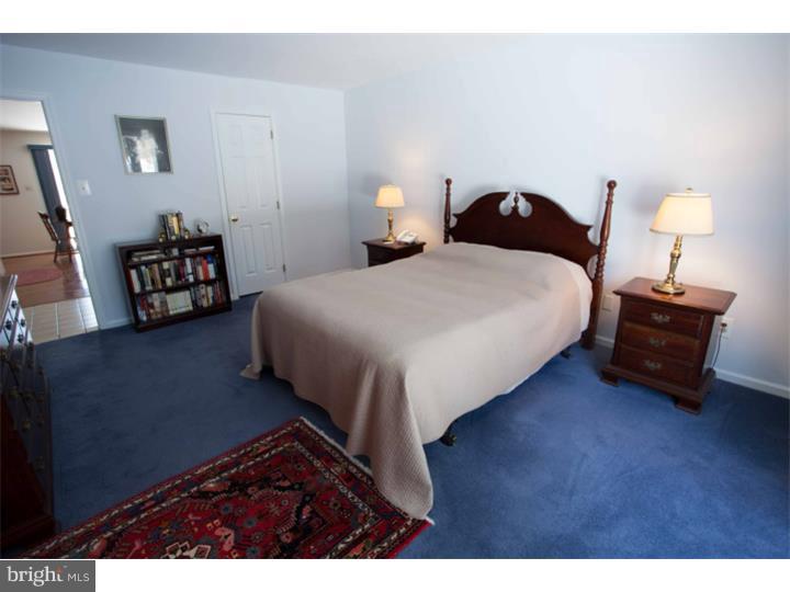 428 Waynesbrooke Road Berwyn, PA 19312 - Photo 14 of 25 a bedroom with a bed and window