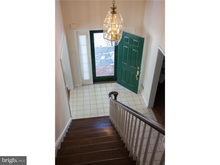 428 Waynesbrooke Road Berwyn, PA 19312 - Photo 3 of 25 a view of a hallway statue with wooden floor