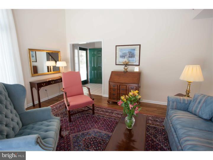 428 Waynesbrooke Road Berwyn, PA 19312 - Photo 5 of 25 a living room with furniture and a lamp