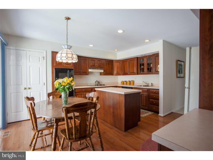 428 Waynesbrooke Road Berwyn, PA 19312 - Photo 9 of 25 a kitchen with a table and chairs in it