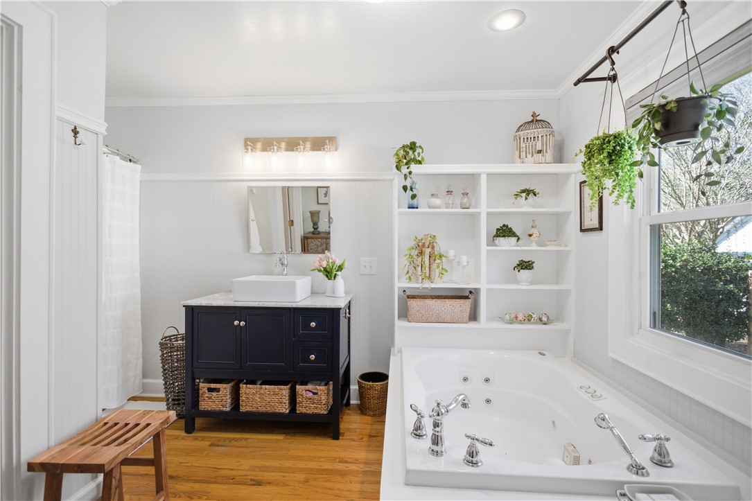 310 Retreat Street Westminster, SC 29693 - Photo 11 of 46 This bright bathroom features a spacious tub and stylish vanity.