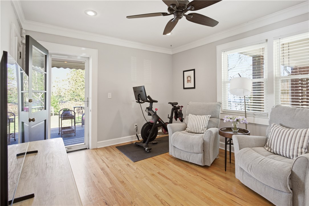 310 Retreat Street Westminster, SC 29693 - Photo 18 of 46 This versatile space features hardwood floors and easy outdoor access, perfect for relaxation or a home gym.