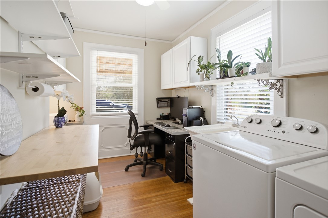 310 Retreat Street Westminster, SC 29693 - Photo 24 of 46 This versatile room combines laundry convenience with a functional workspace.