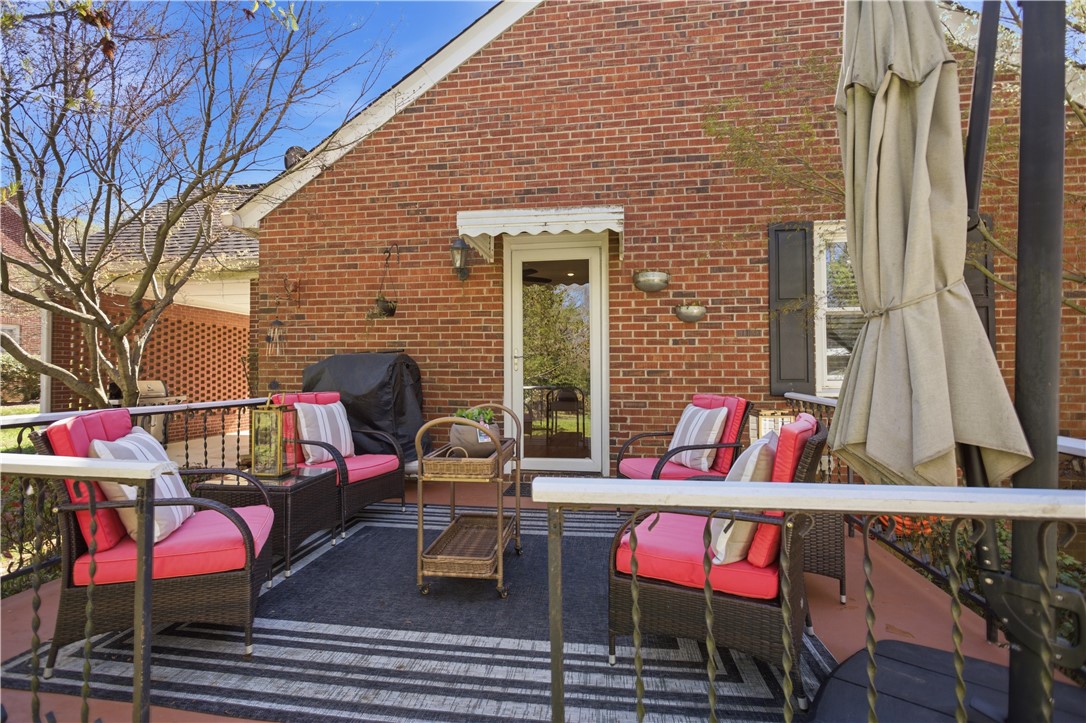 310 Retreat Street Westminster, SC 29693 - Photo 26 of 46 An inviting outdoor living space features a brick exterior and a charming patio for relaxation.