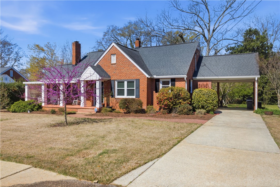 310 Retreat Street Westminster, SC 29693 - Photo 3 of 46 This classic brick residence features a welcoming covered porch, mature landscaping, and a convenient carport.