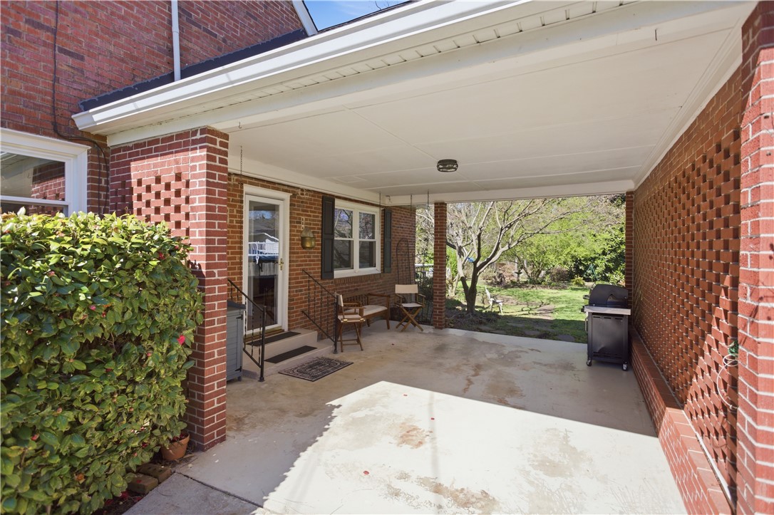 310 Retreat Street Westminster, SC 29693 - Photo 35 of 46 This inviting exterior boasts a covered patio, perfect for outdoor enjoyment and relaxed living.