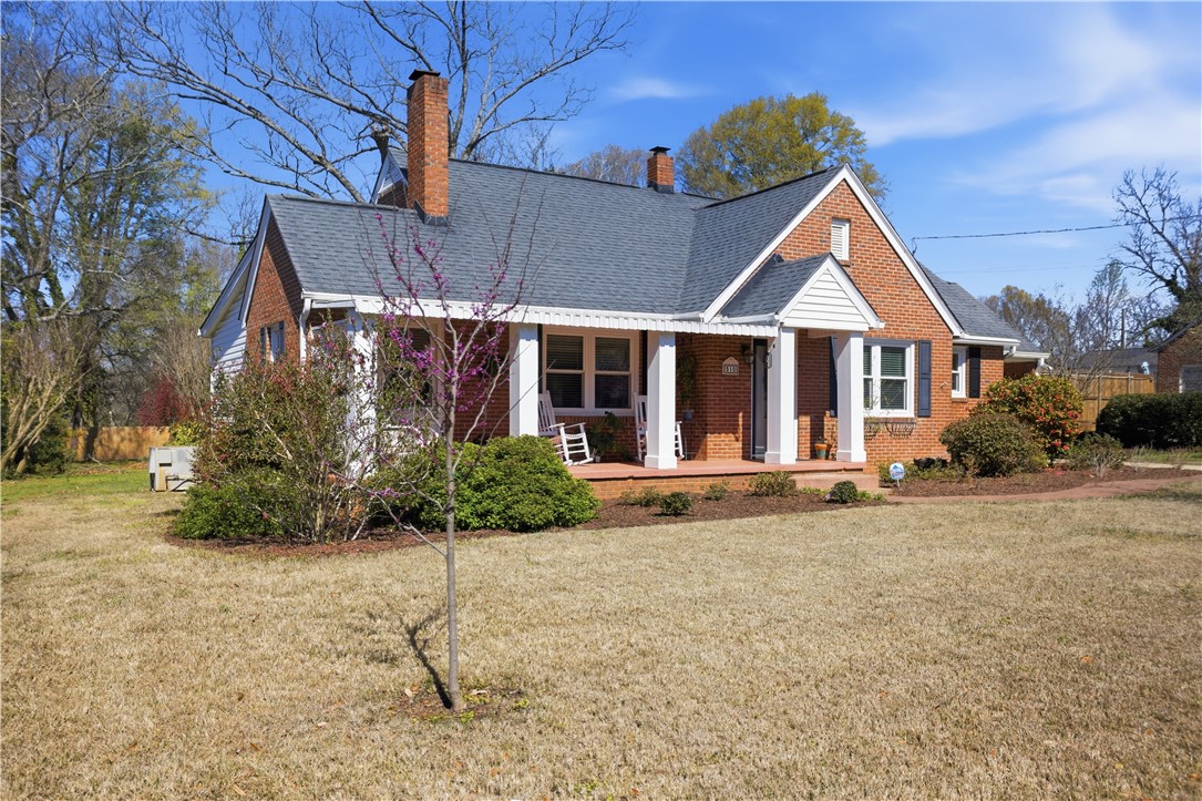 310 Retreat Street Westminster, SC 29693 - Photo 5 of 46 This charming home features a brick exterior and a welcoming porch, nestled in a vibrant community.