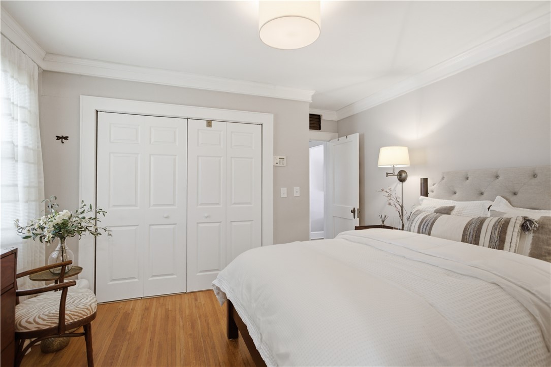 310 Retreat Street Westminster, SC 29693 - Photo 9 of 46 This bright and inviting bedroom features warm wood flooring and elegant crown molding.