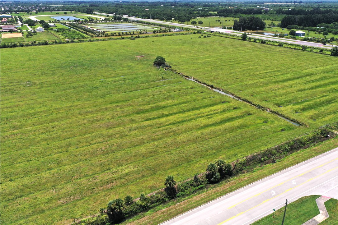Tbd 57th Street Vero Beach, FL 32967 - Photo 24 of 27 a view of a lake with a big yard