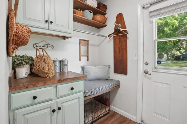 a kitchen with a sink and a window