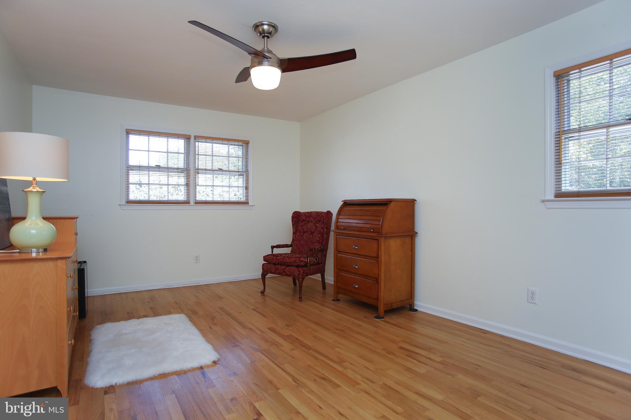 4 Indian Run Road Princeton Junction, NJ 08550 - Photo 18 of 43 a workspace room with furniture and wooden floor