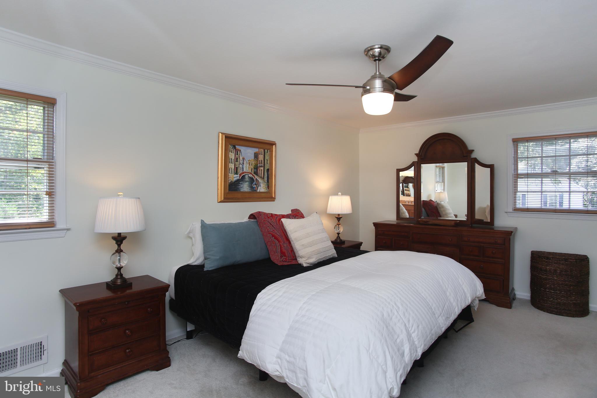 4 Indian Run Road Princeton Junction, NJ 08550 - Photo 26 of 43 a spacious bedroom with two beds and a window