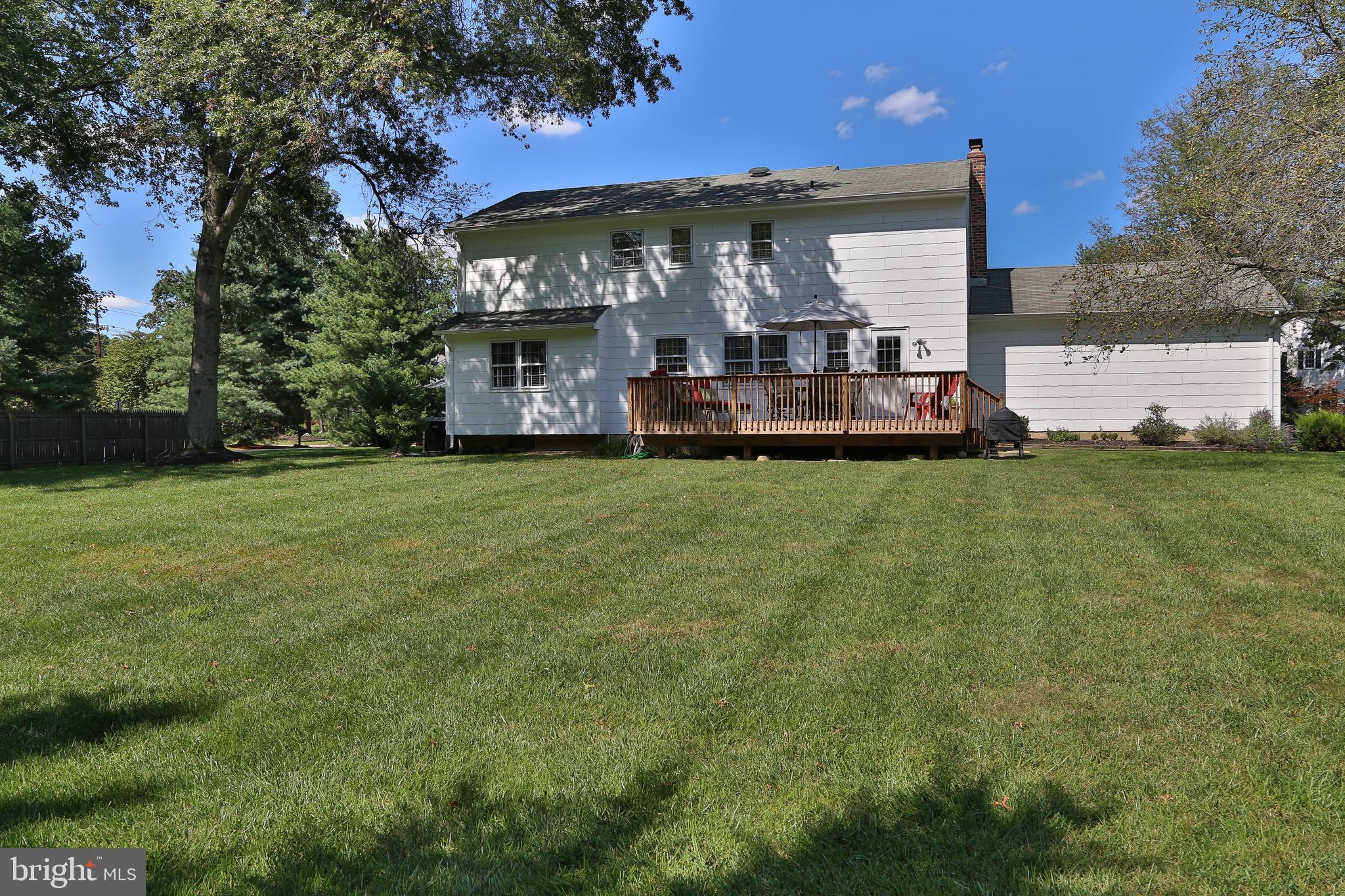 4 Indian Run Road Princeton Junction, NJ 08550 - Photo 35 of 43 a view of a big house with a big yard and large trees