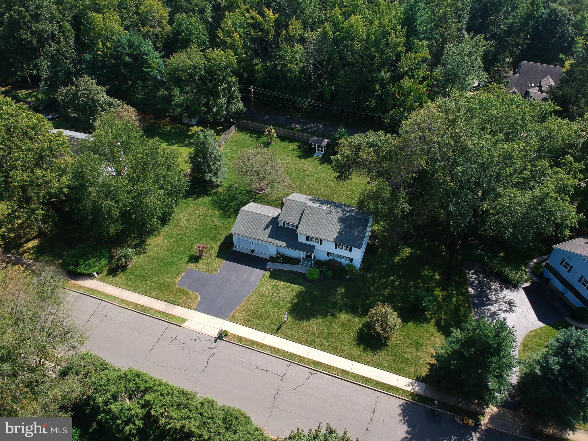 4 Indian Run Road Princeton Junction, NJ 08550 - Photo 40 of 43 an aerial view of house with yard swimming pool and outdoor seating